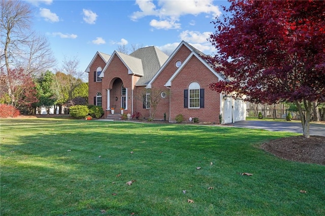 front facade with a front lawn