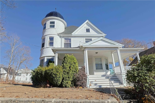 victorian home featuring a porch