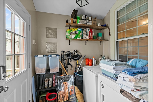 laundry area with washing machine and dryer