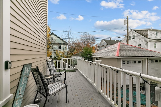 wooden deck with a garage