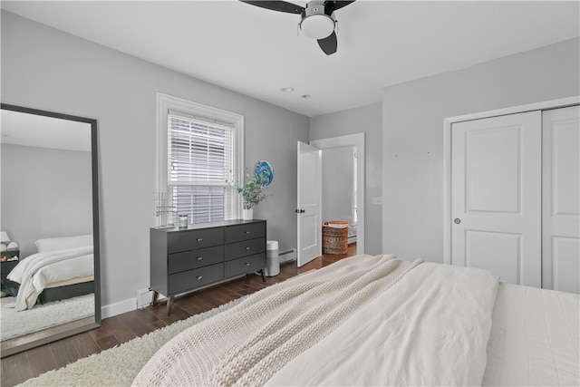 bedroom featuring a closet, ceiling fan, and dark wood-type flooring