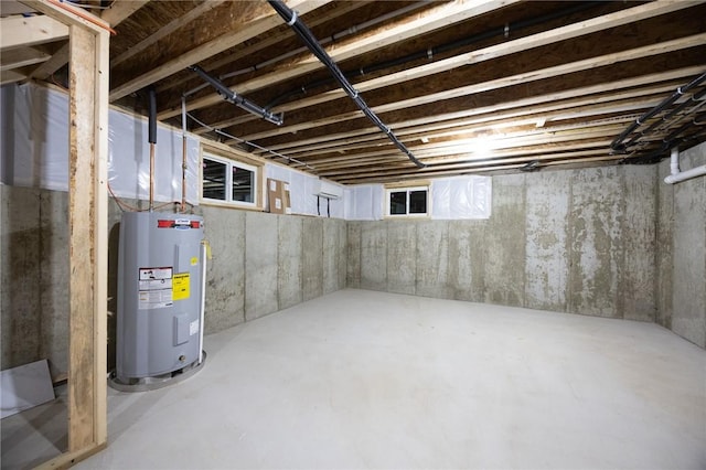 basement featuring electric water heater