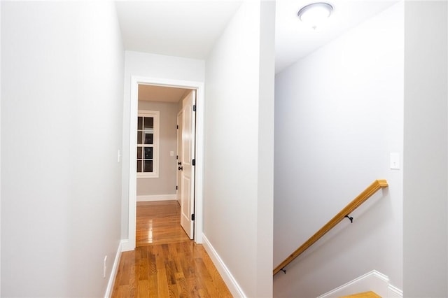 corridor featuring light hardwood / wood-style floors