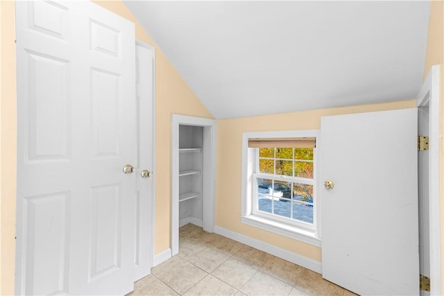 interior space featuring lofted ceiling