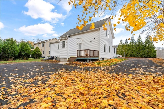 view of home's exterior with a deck