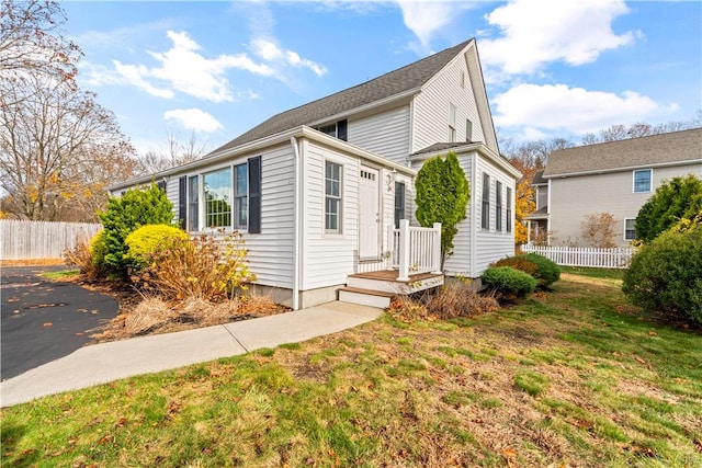 view of front of home with a front yard