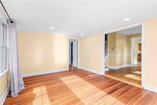 unfurnished room featuring wood-type flooring