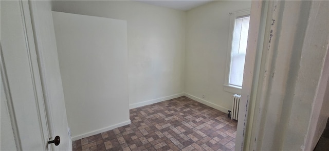 empty room featuring radiator