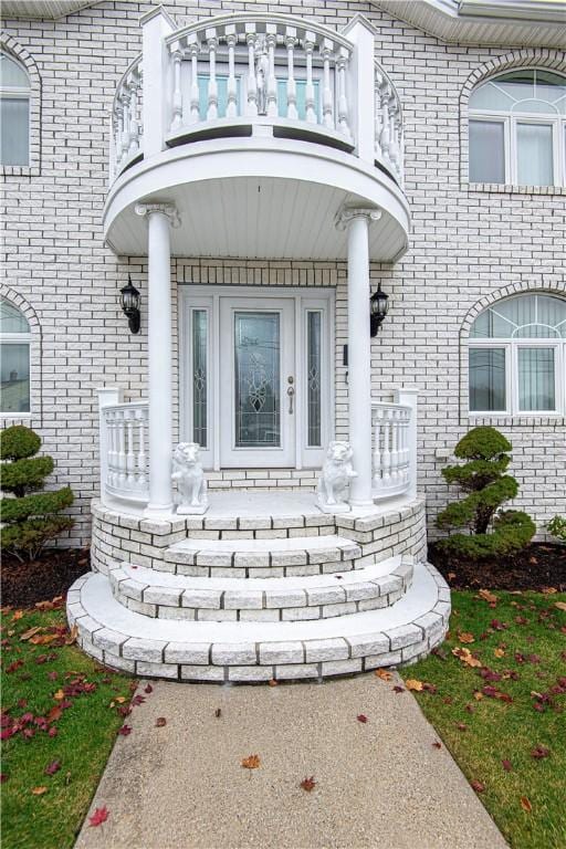 doorway to property with a balcony