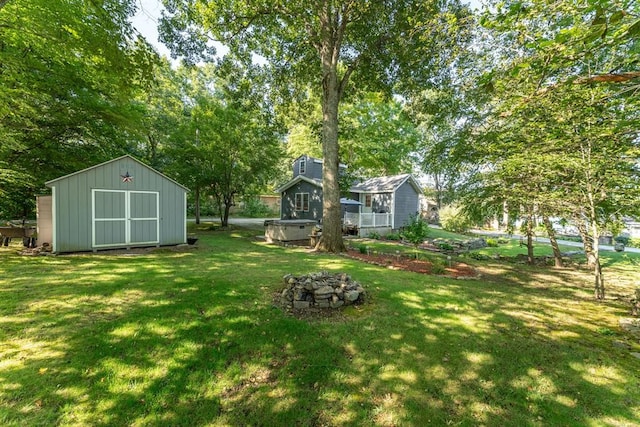 view of yard featuring a storage unit