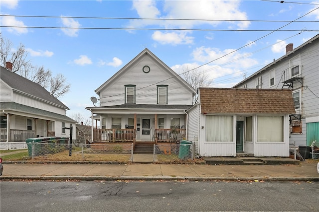 view of front of property featuring covered porch