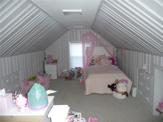 bedroom with carpet and vaulted ceiling