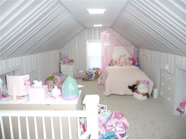 bedroom with carpet and lofted ceiling