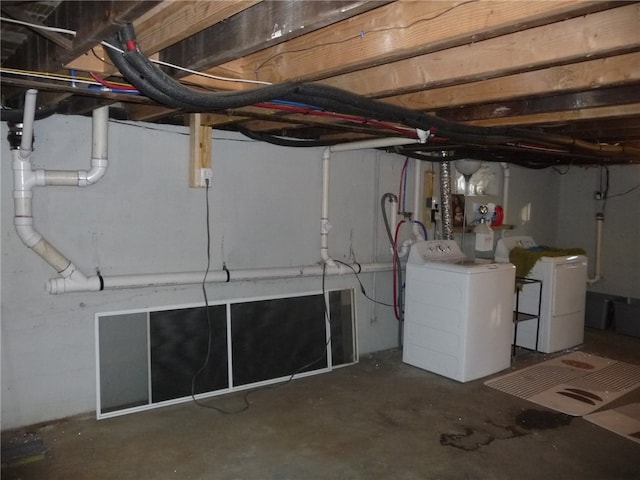 basement with washing machine and dryer