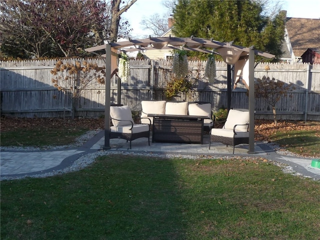 view of yard with an outdoor living space and a patio area