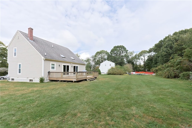 view of yard with a wooden deck