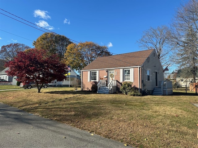 view of front facade with a front lawn