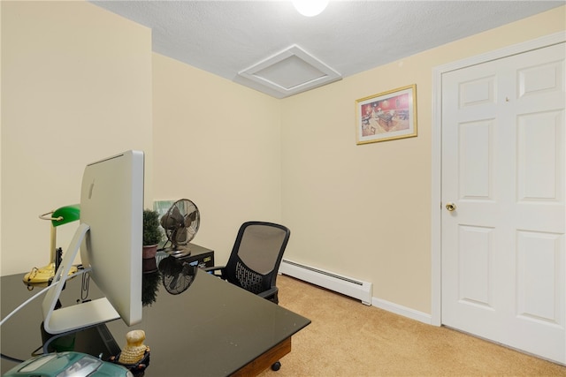 carpeted home office featuring baseboard heating and a textured ceiling