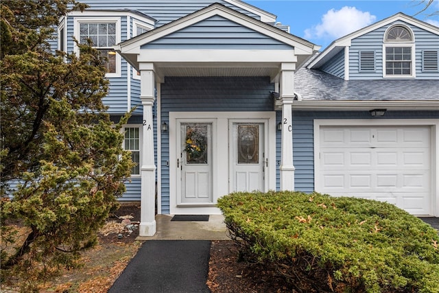 property entrance featuring a garage