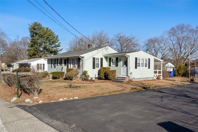 single story home with a carport