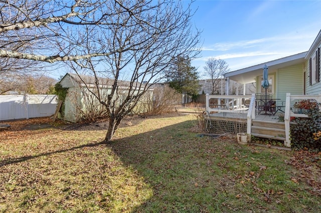 view of yard featuring a deck