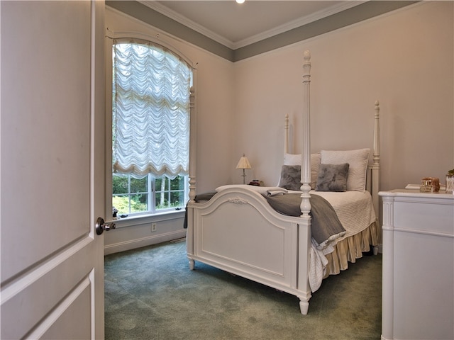 bedroom with dark colored carpet and crown molding