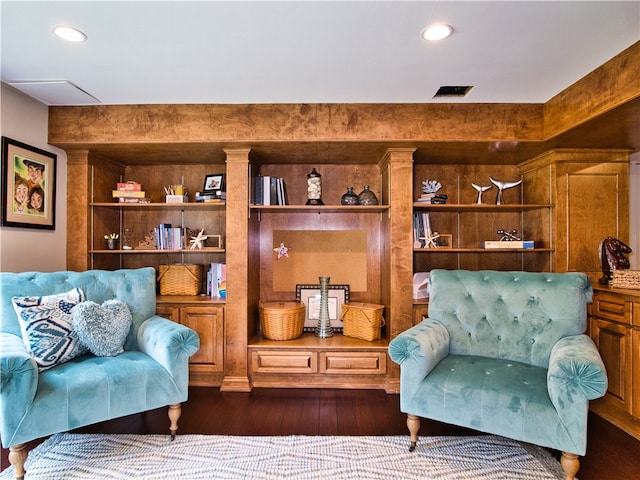 living area featuring dark wood-type flooring