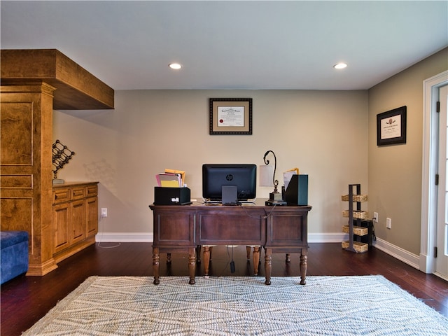 home office with dark wood-type flooring