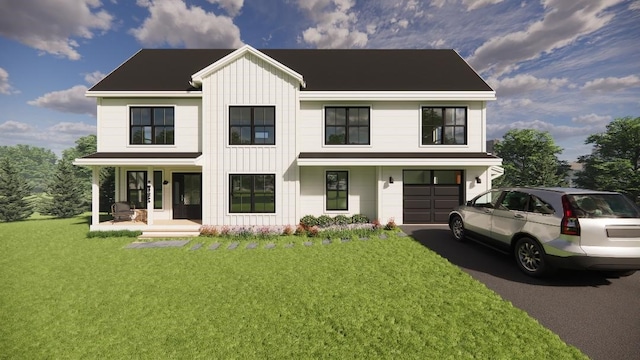 modern farmhouse featuring a garage, a front lawn, and covered porch