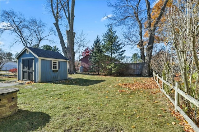 view of yard with a storage unit