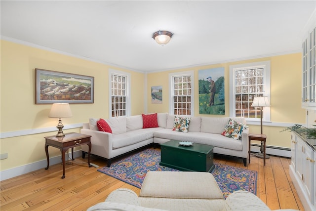 living room featuring light hardwood / wood-style floors, a baseboard radiator, and ornamental molding