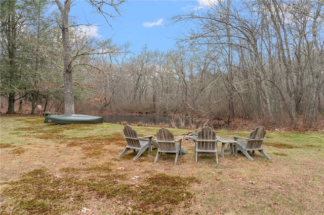 view of yard featuring a fire pit