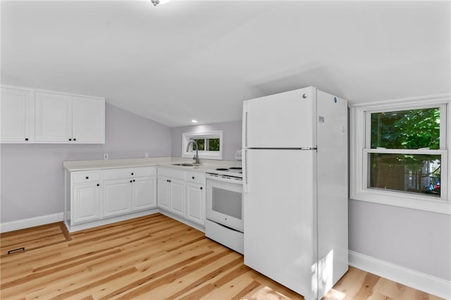 kitchen with white cabinetry, sink, lofted ceiling, white appliances, and light wood-type flooring