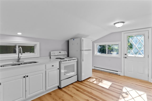 kitchen featuring light wood-type flooring, white appliances, sink, a baseboard radiator, and white cabinets