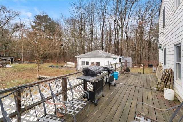 wooden terrace with area for grilling