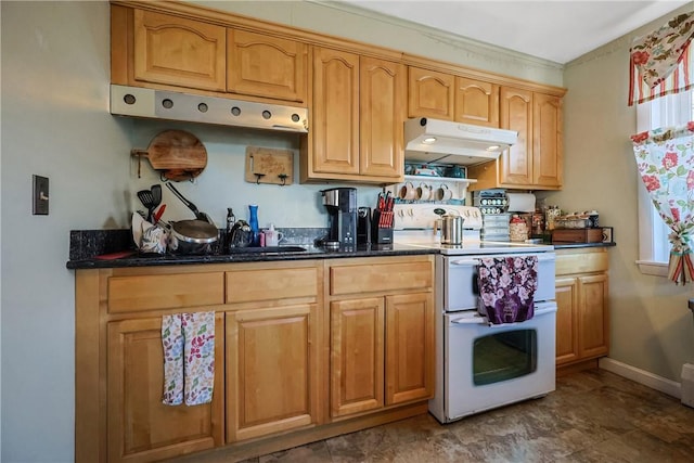 kitchen with dark stone counters and range