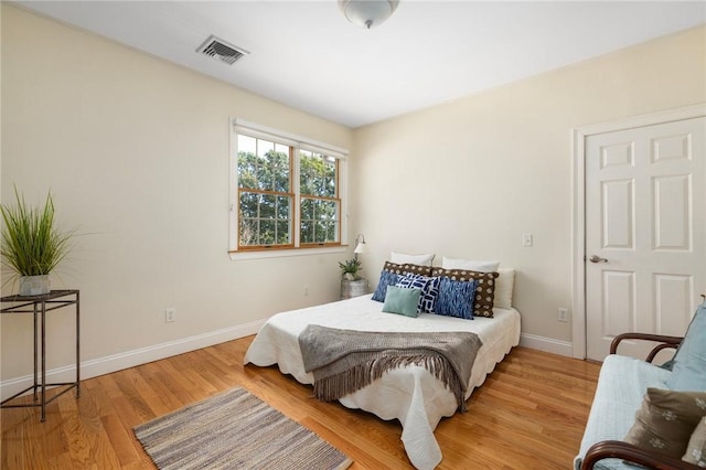 bedroom with light wood-type flooring