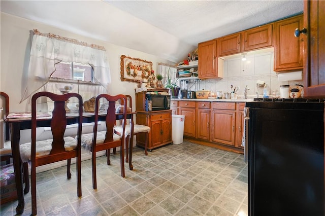 kitchen featuring lofted ceiling