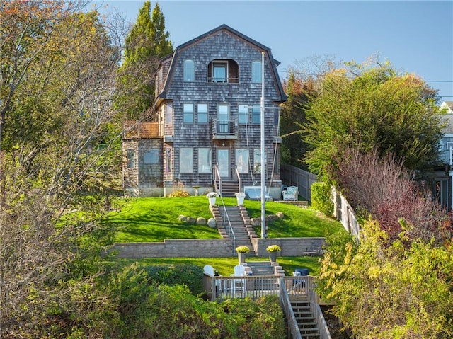 view of front of property with a front lawn