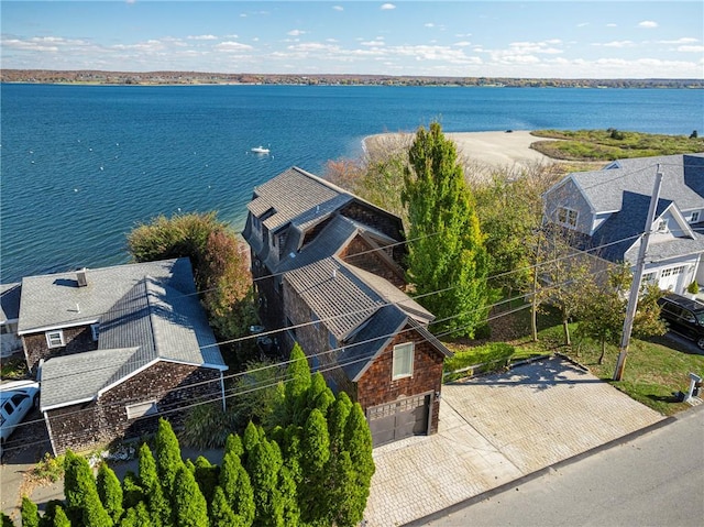 drone / aerial view with a water view