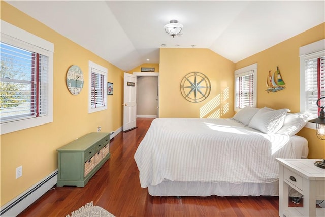 bedroom featuring dark hardwood / wood-style floors, lofted ceiling, multiple windows, and a baseboard heating unit