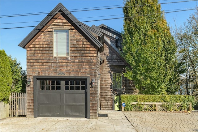 exterior space featuring a garage