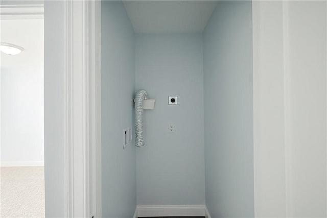 clothes washing area featuring carpet floors and hookup for an electric dryer