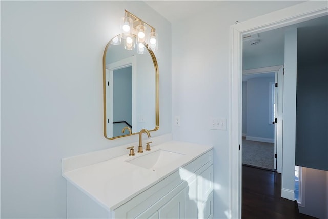 bathroom with wood-type flooring and vanity