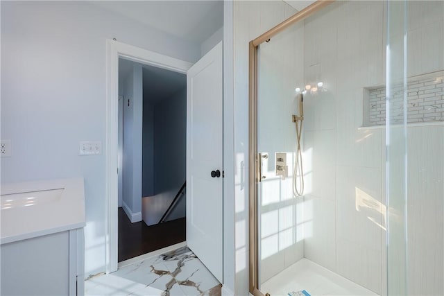 bathroom featuring an enclosed shower