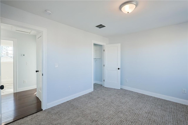 empty room featuring hardwood / wood-style flooring