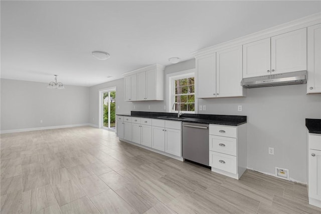 kitchen featuring sink, stainless steel dishwasher, a notable chandelier, decorative light fixtures, and white cabinets