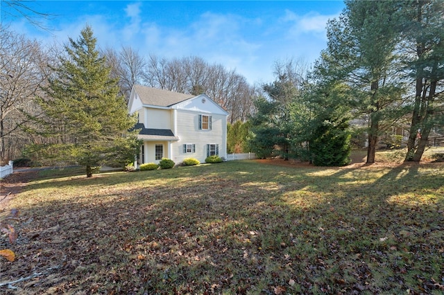 view of home's exterior featuring a yard