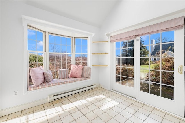 unfurnished sunroom with lofted ceiling and a baseboard heating unit