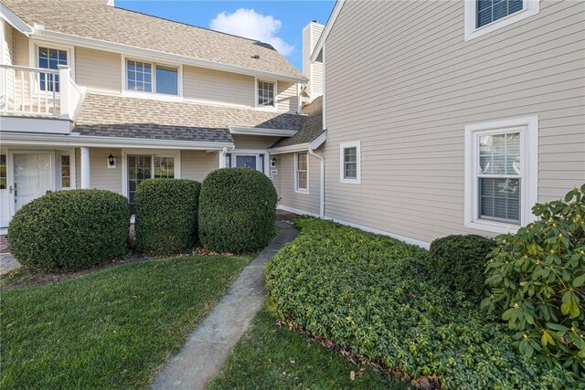 exterior space with a front yard